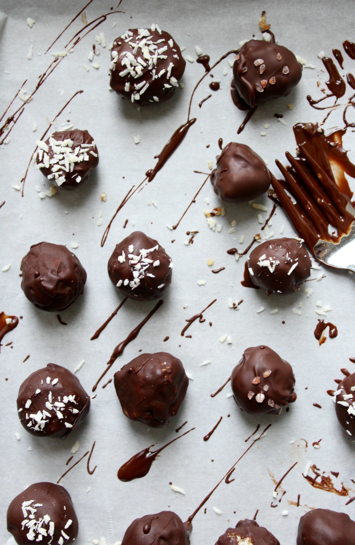 Vegan, gluten free, and naturally sweetened 4-ingredient Chocolate Covered Coconut Bites! Yum!!